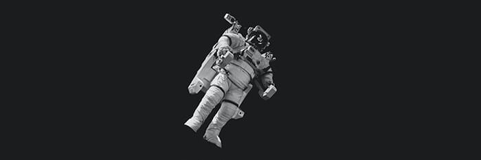Astronaut floating in black space